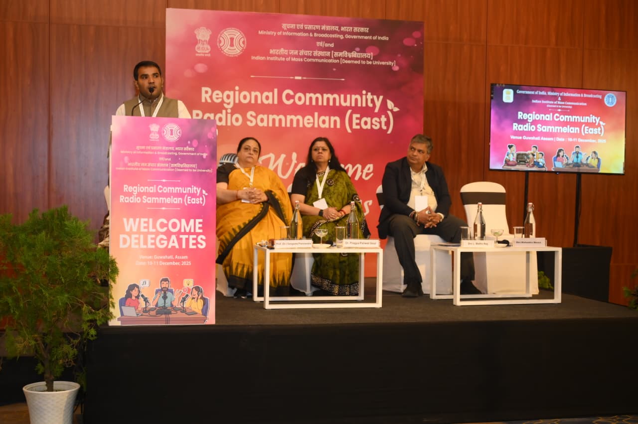 New Delhi, 10th December, 2025: The two-day Regional Community Radio Sammelan (East) was inaugurated in Guwahati today. Organised by the Ministry of Information & Broadcasting, Government of India, in collaboration with the Indian Institute of Mass Communication (IIMC), New Delhi, the theme of the Sammelan is “Celebrating 20 Years of Community Radio in India.” More than 65 Community Radio Stations from the Eastern and Northeastern region are participating in the event.

Welcoming the gathering, Dr. Pragya Paliwal Gaur, Vice Chancellor of IIMC, New Delhi said that it was an honour for IIMC to partner with the Ministry for this milestone gathering. She highlighted the growth of the Community Radio ecosystem, with over 550 stations now operating across India and more in the pipeline, including in the Northeast. Dr. Gaur spoke about the important role of Community Radio in promoting gender-sensitive communication, disseminating emergency information, involving students of media education, preserving folk traditions, and responsibly integrating AI in content development. She urged stakeholders to work together to strengthen community-led development through Community Radio.

Delivering his address, Shri L. Madhu Nag, Registrar, IIMC, highlighted the significant transformation of India’s radio landscape—from mainstream FM broadcasting to the emergence of Community Radio as a powerful platform for local voices. Emphasizing the core pillars of strengthening CR stations, he underscored the importance of community-driven content creation, enhanced capacity building, and long-term financial sustainability. He noted that creatively produced, locally rooted content remains central to the success of Community Radio.

Ms Shilpa Rao, Director CRS, Ministry of Information and Broadcasting informed about the objectives of the Sammelan and mentioned that the Ministry of Information and Broadcasting is committed to the growth and reinforcement of the Community Radio sector in the North East Region. She also appraised them about the initiatives taken by the Ministry of Information and Broadcasting in this regard.

Shri Mahendra Meena, Under Secretary, Ministry of Information & Broadcasting, remarked that Community Radio stations have become indispensable for last-mile communication. He stated that CR stations amplify real community voices and help ensure accurate information reaches people during emergencies and developmental programmes. He reaffirmed the Ministry’s continued support to the Community Radio movement.

Prof. (Dr.) Sangeeta Pranvendra, Convenor of the Sammelan, extended a warm vote of thanks to all participants for travelling to Guwahati and joining the collective celebration of two decades of India’s Community Radio movement. She appreciated the commitment of CR practitioners and experts who continue to strengthen grassroots broadcasting across the region.

The first day of the sammelan featured several technical and interactive sessions. Deputy Wireless Advisor, Ministry of Telecommunications Shri Manish Sheelwant spoke in detail about transmitter replacement and migration to the SARAL Sanchar portal, along with guidance on applying for WoL renewal.

Prof. (Dr.) Kanchan K. Malik stressed on the relevance of gender based programming and the vital role of women in CRS programming and participation in the overall content management and broadcasting.

A panel discussion on the engagement of State Governments in promoting Community Radio across the eastern region, moderated by Shri Amit Dwivedi, Project Director CRS engaged with CRS practitioners from Bihar, Manipur, Assam, West Bengal and Odisha.

The first day also included an insightful session on ‘Promotion and Preservation of Indigenous Languages and CRS’ led by Prof. Uma Pappuswamy from the Central Institute of Indian Languages, Mysuru. She said that as the nature of the CRS is hyperlocal, indigenous languages can best be preserved and promoted through the CRS.

The day concluded with a session on community-based content, delivered by Shri N. A. Shah Ansari, Director, Radio Namaskar, Konark, Odisha. He spoke on the best practices to be adopted while creating community based content.

The Sammelan provides Community Radio practitioners a platform to share experiences, raise concerns, explore innovative approaches and collectively strengthen the future of grassroots broadcasting across the eastern and northeastern region.